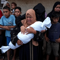 Palestinians mourn